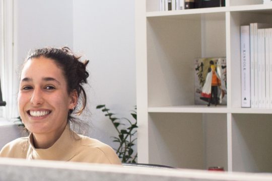 Smiling worker in office